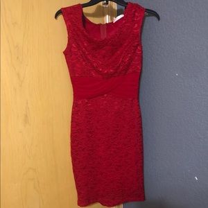 Woman’s red above the knee bodycon dress
